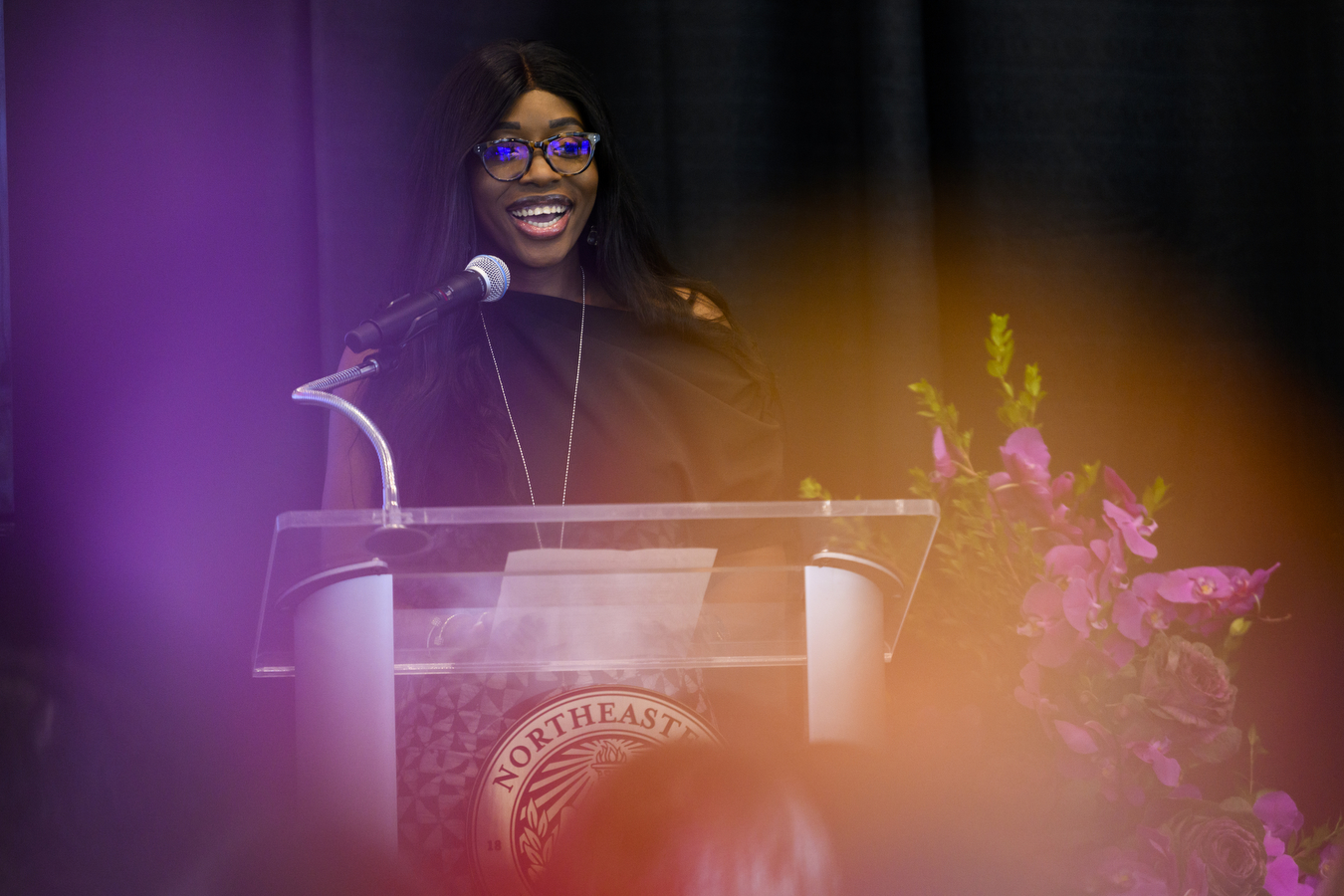 Woman speaking at podium