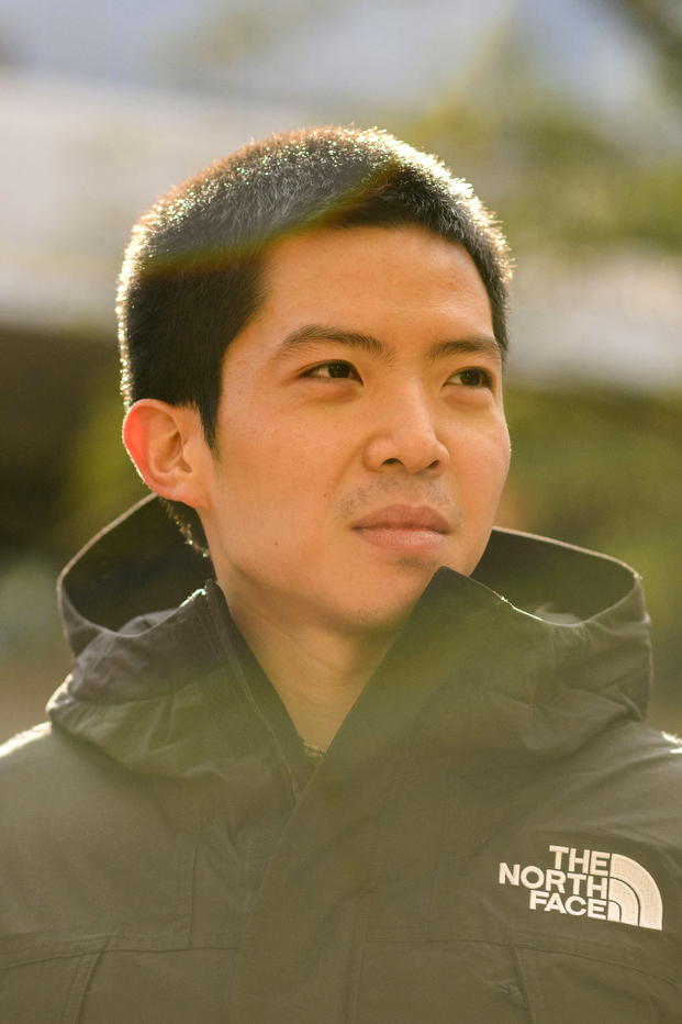 headshot of benjamin zi-hao tan