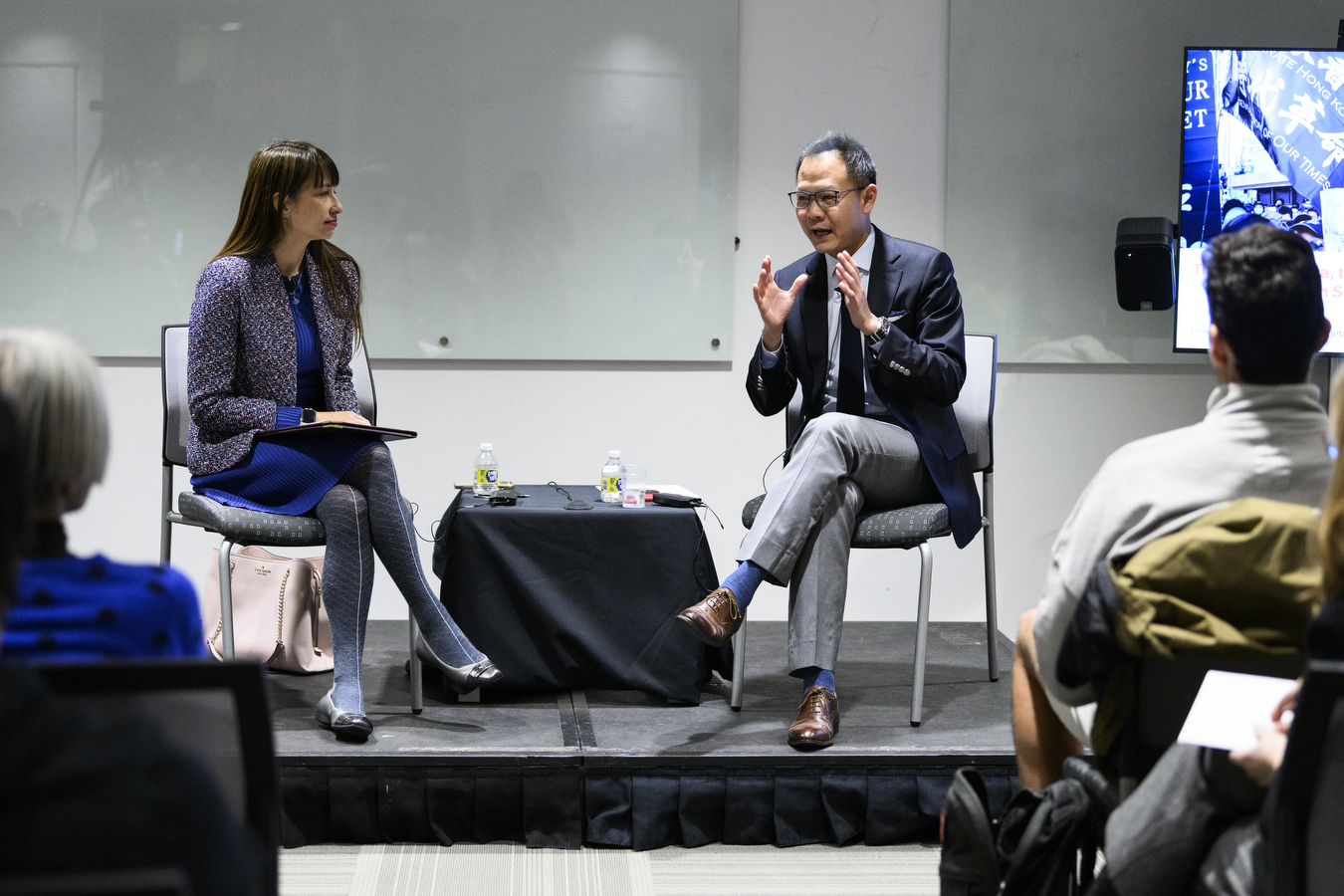 speakers at a panel discussion