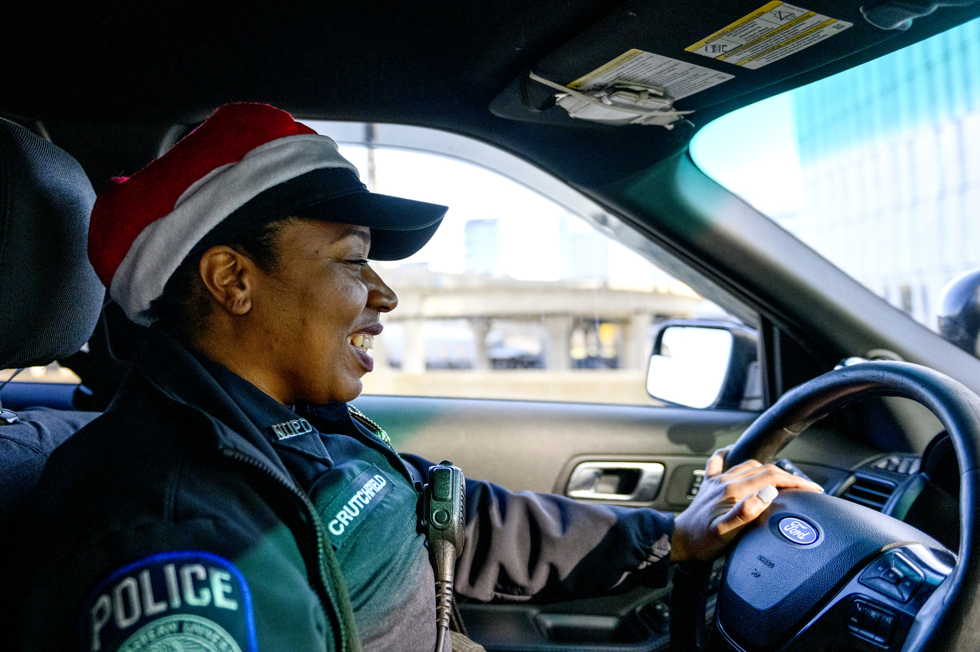 police officer driving a cruiser