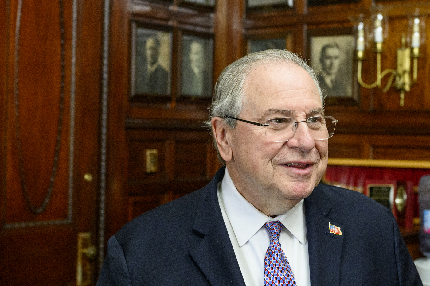 headshot of robert deleo in the massachusetts state house chamber