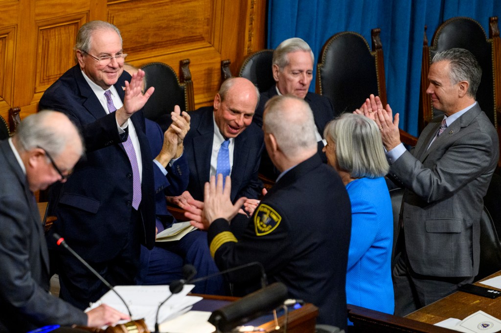 robert deleo speaking with group of people in the massachusetts state house chamber