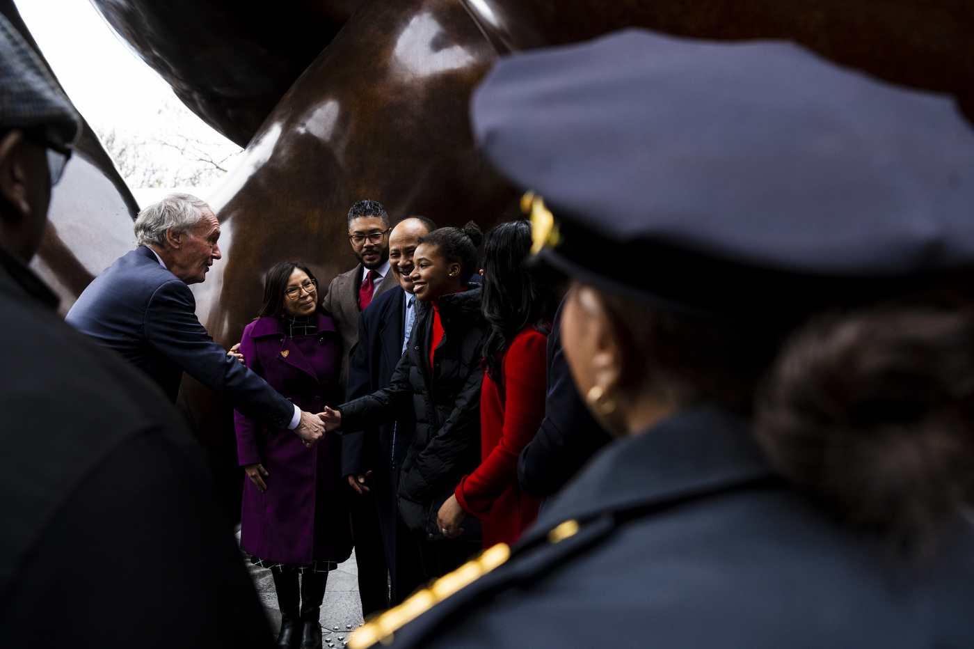 two people shake hands