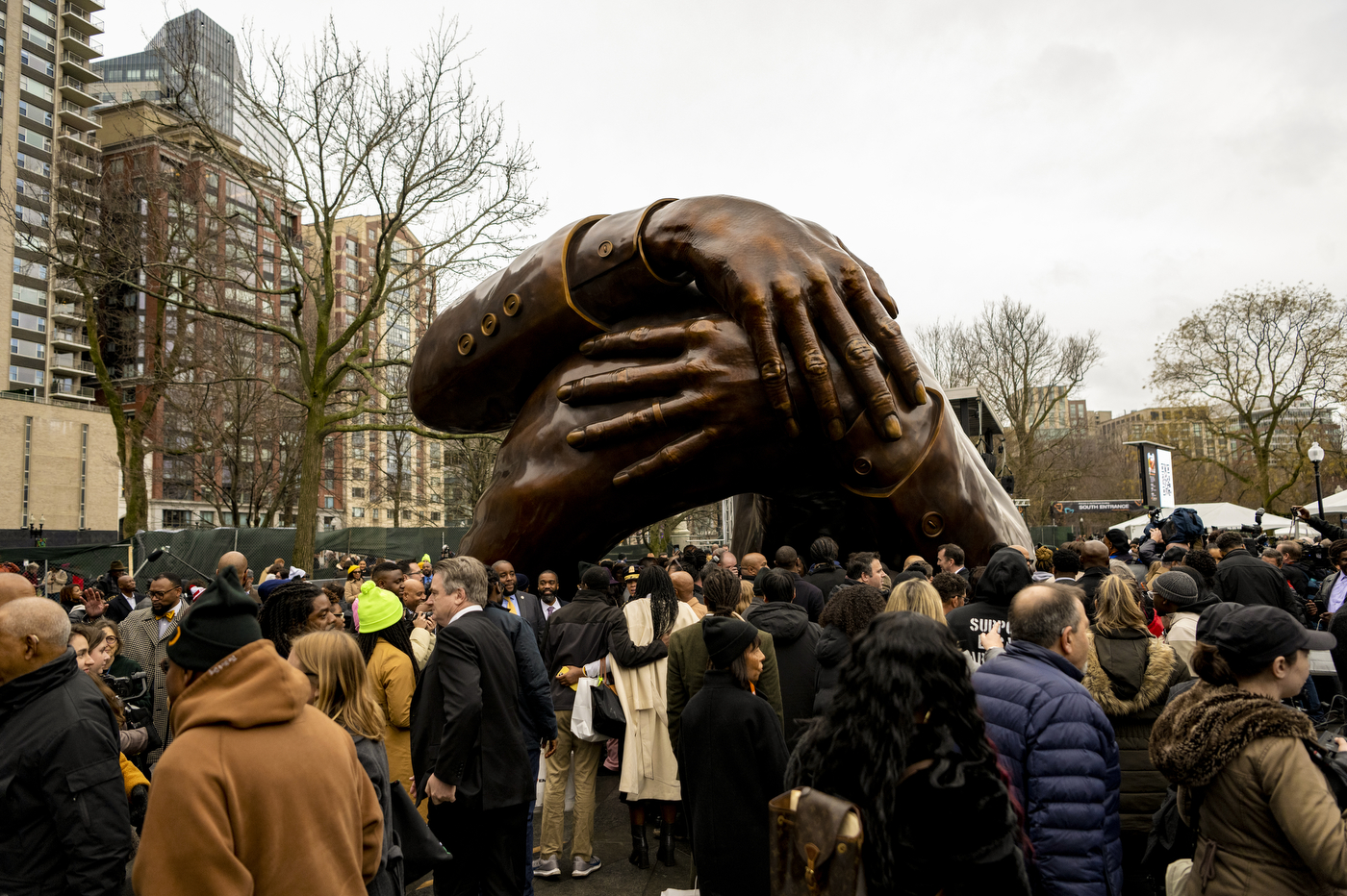 The new MLK Statue in Boston Common, The Embrace, surrounded by people