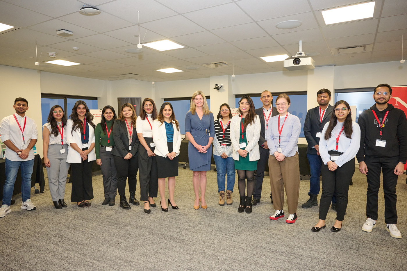 jill dunlop posing with a group of people