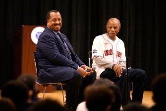 richard o'bryant and another person sitting on stage