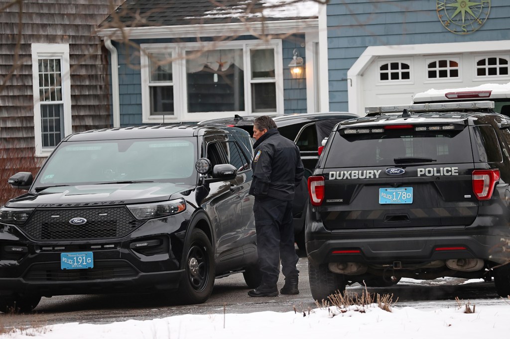 police cars outside of residential home