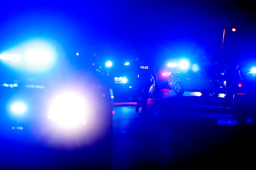 police cars with their flashing lights on