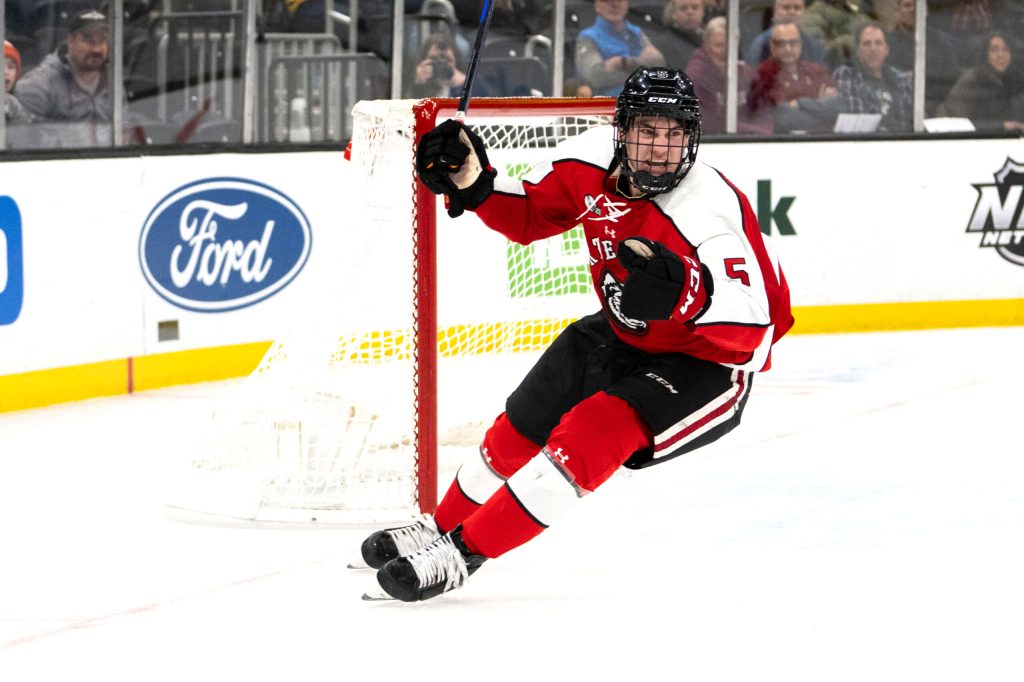 hunter mcdonald skating in front of the net at td garden