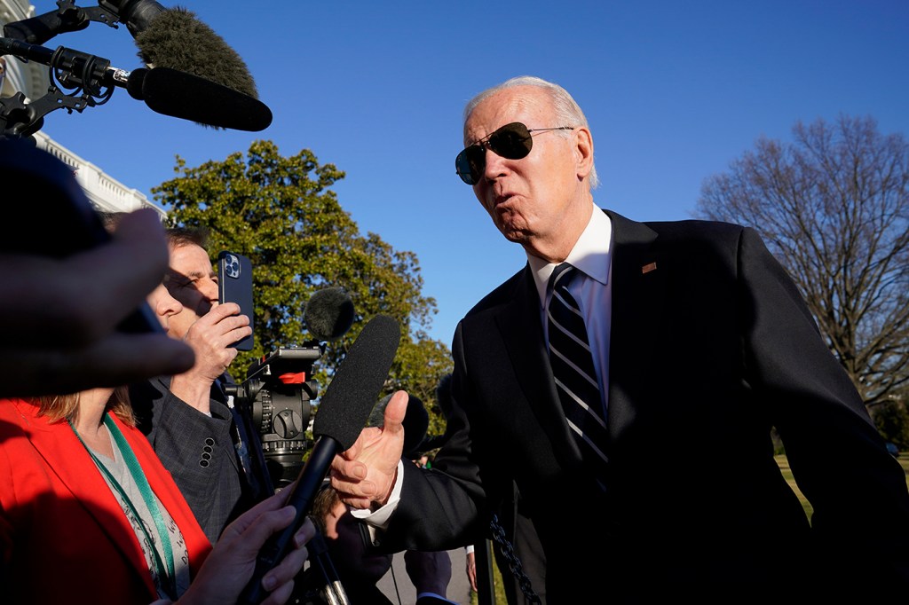 president joe biden speaking to a reporter