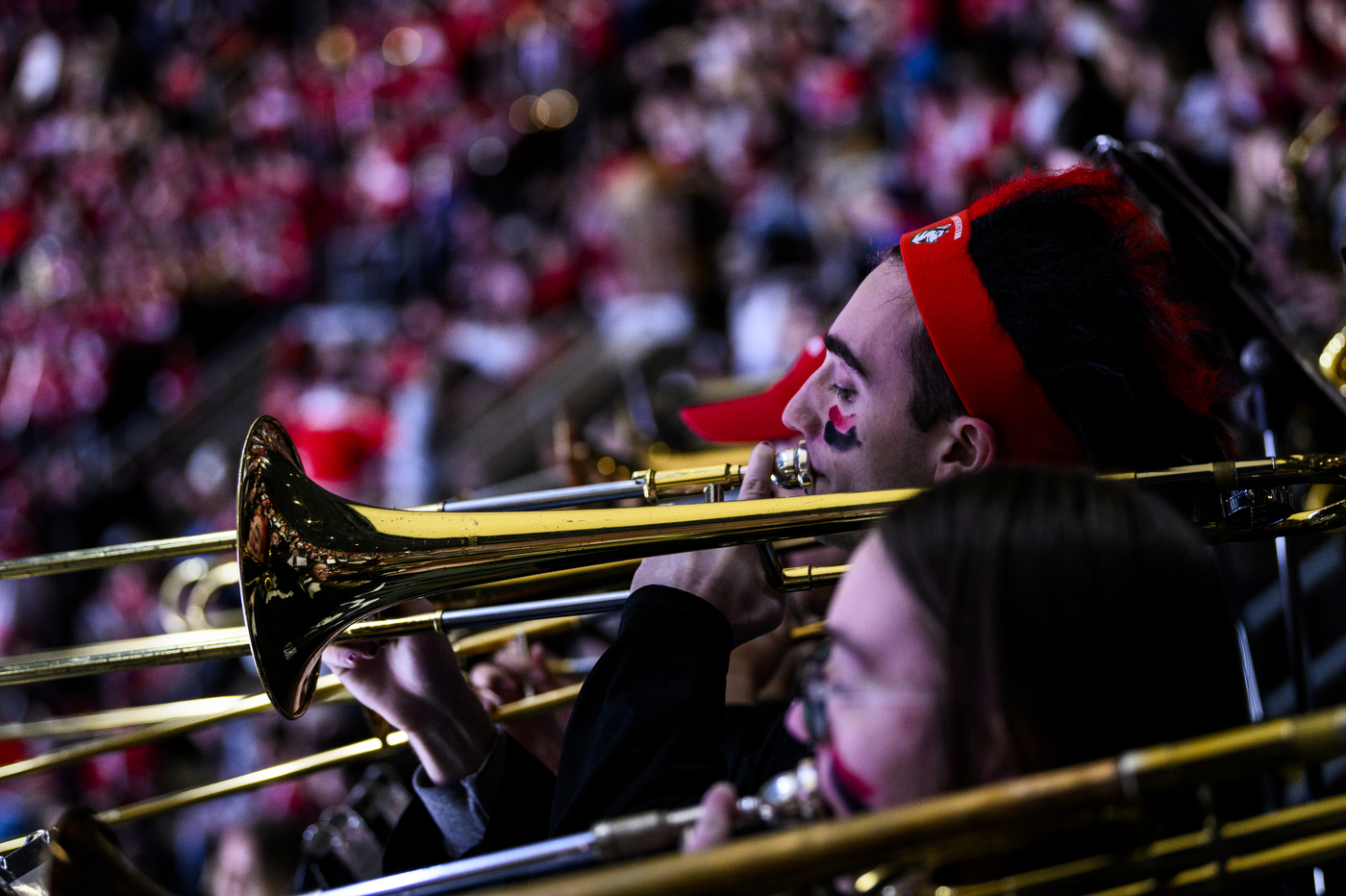 A person plays a trombone