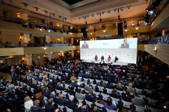 conference room in bayerischer hof hotel in munich filled with attendees