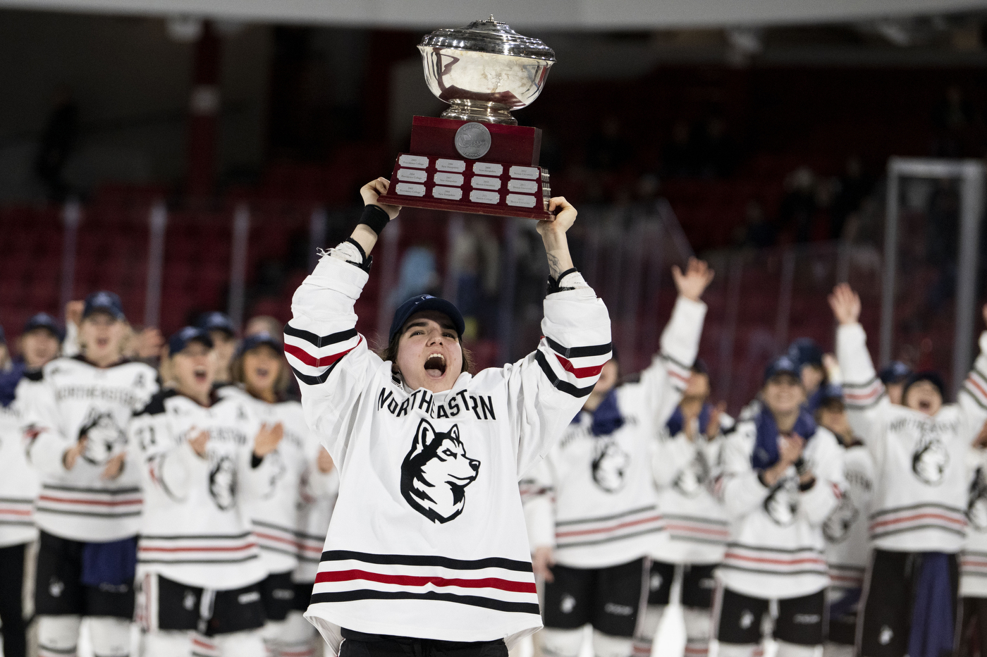 A player raises a trophy