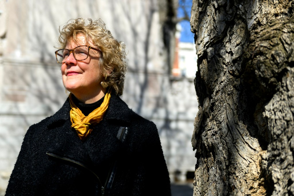 headshot of Melissa Hoffer standing outside