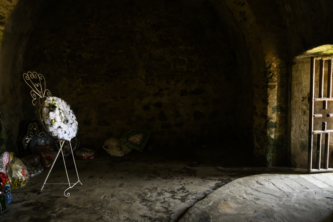 white wreath lain at the Door of No Return in Elmina Castle