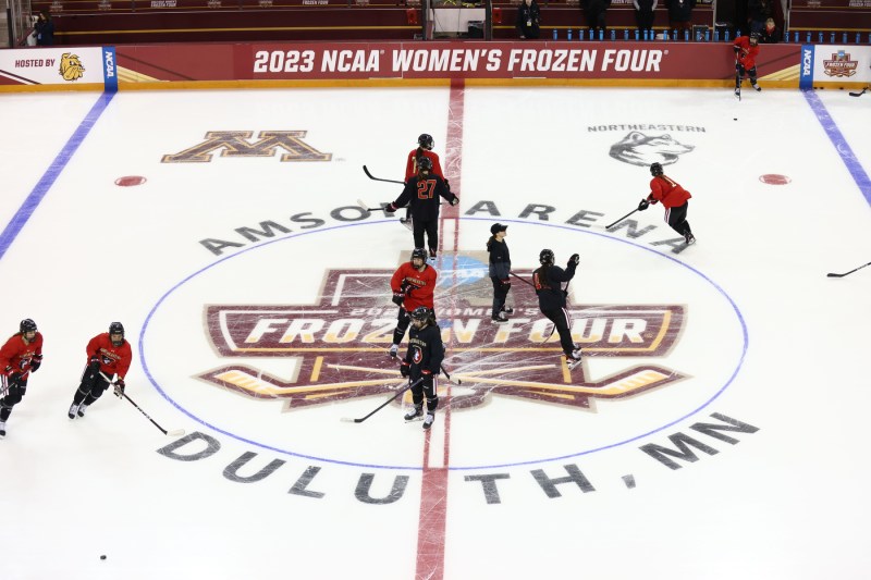 hockey players skating around the rink in Duluth, MN