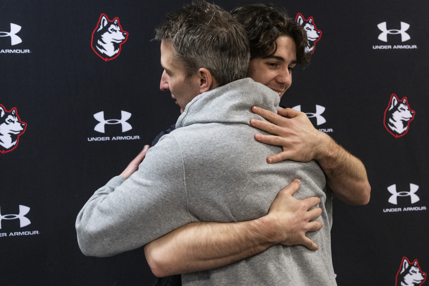 Devon Levi gives another person a hug