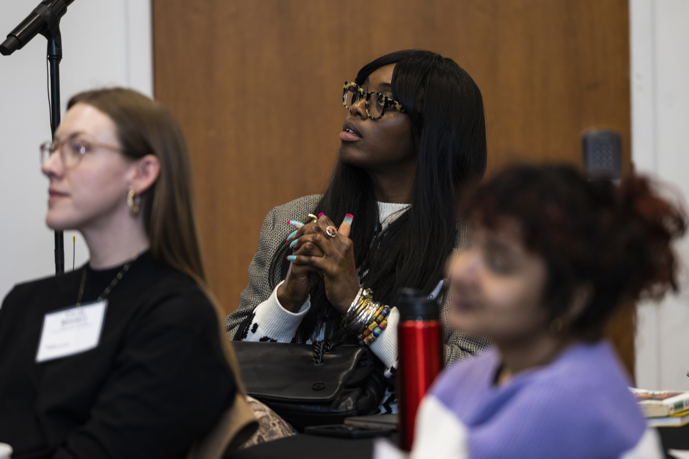 Northeastern community member listening to panelists at Feminists on the Politics of Crisis symposium