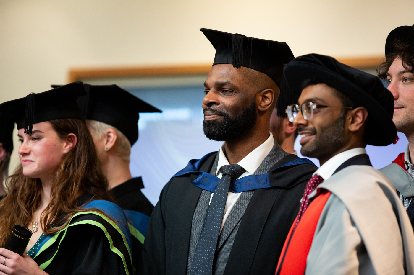 students in caps and gowns