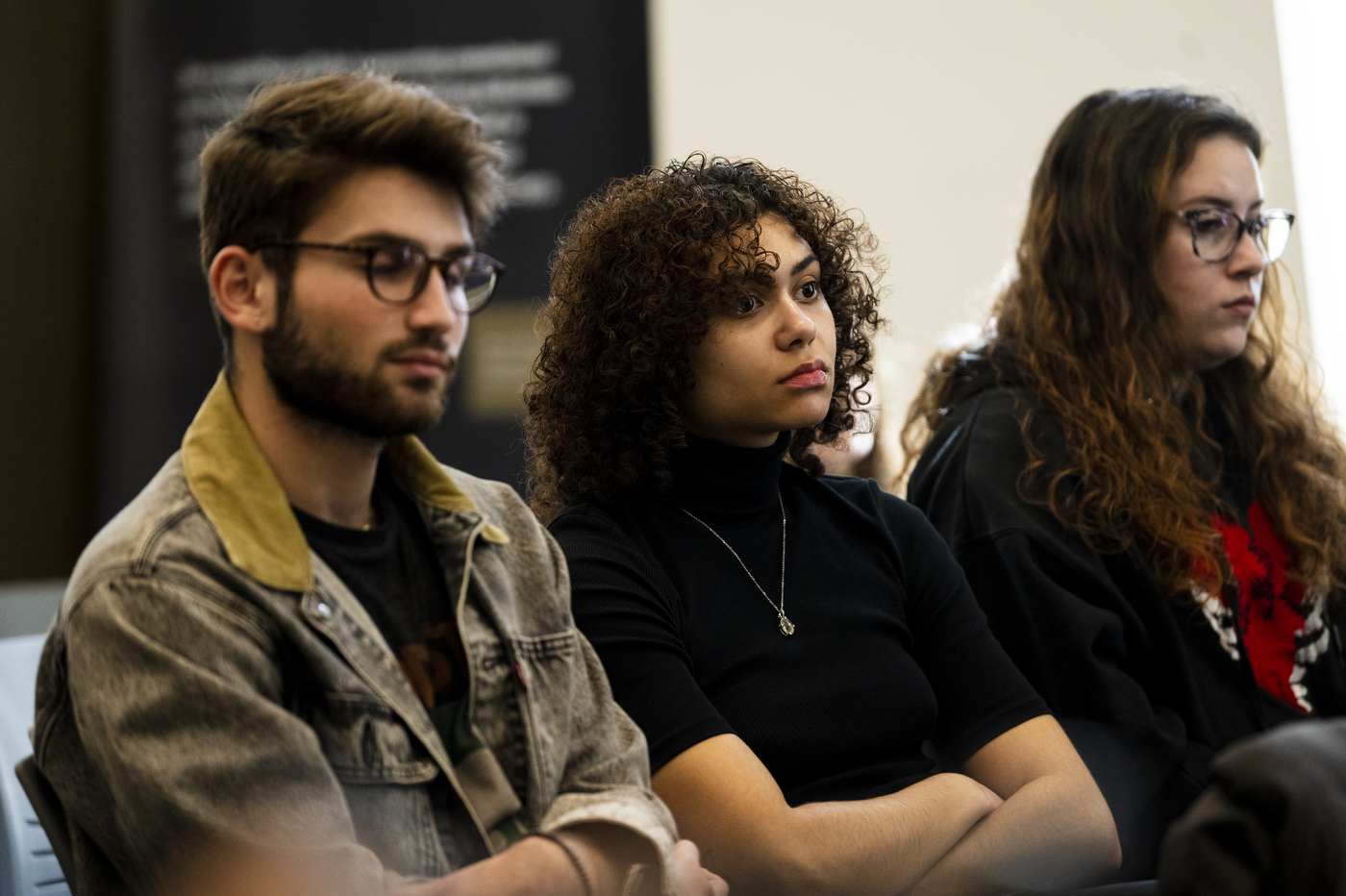 audience members listening to Elizabeth Dopazo speaking at Cabral Center