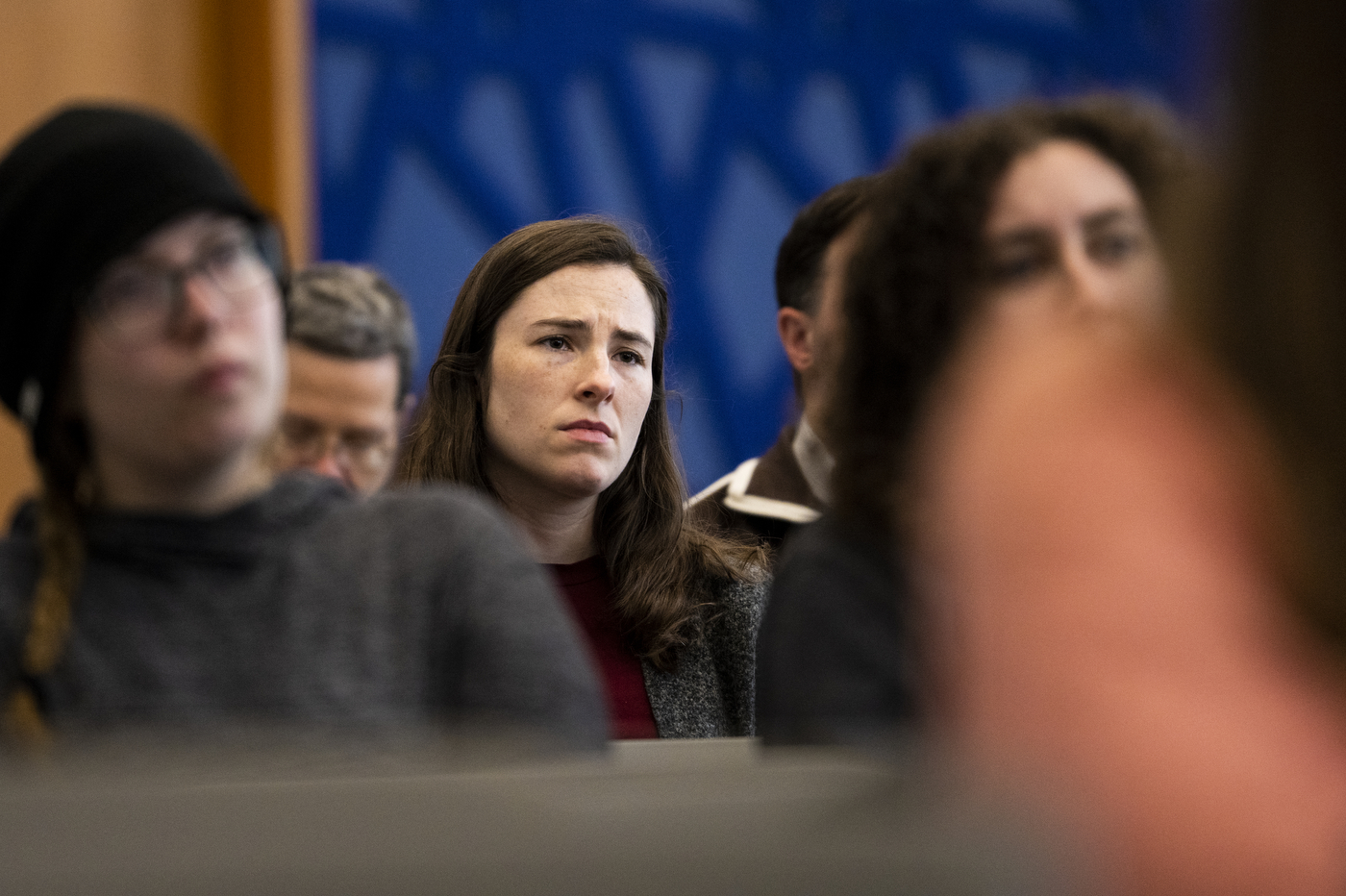 audience members listening to Elizabeth Dopazo speaking at Cabral Center during Holocaust and Genocide Awareness Week.