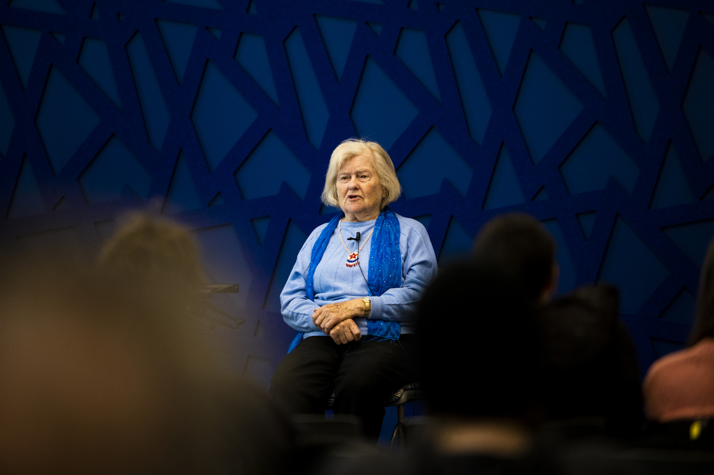 Elizabeth Dopazo speaking at Cabral Center during Holocaust and Genocide Awareness Week.