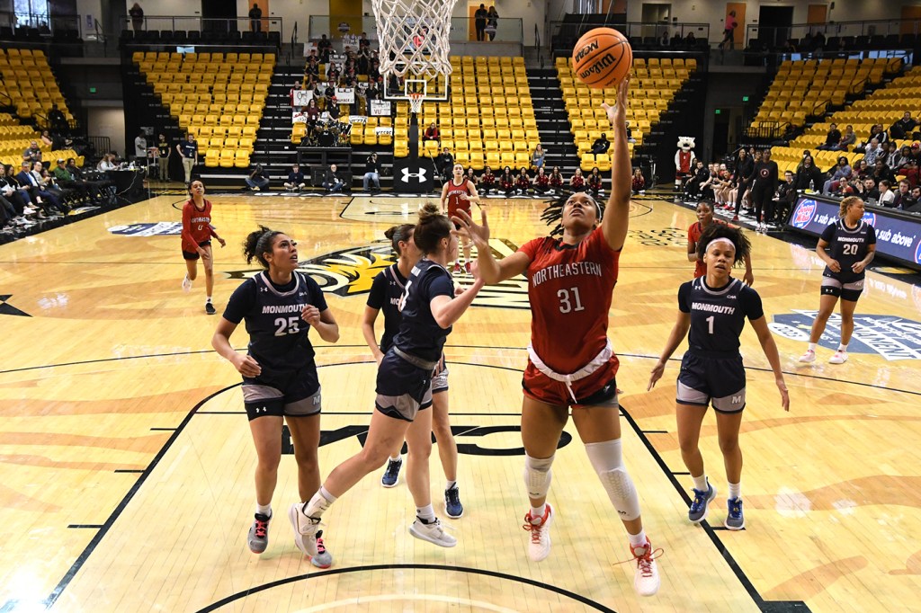 Northeastern's Deja Braxton was a force on the boards in the semifinal match against Monmouth Saturday.