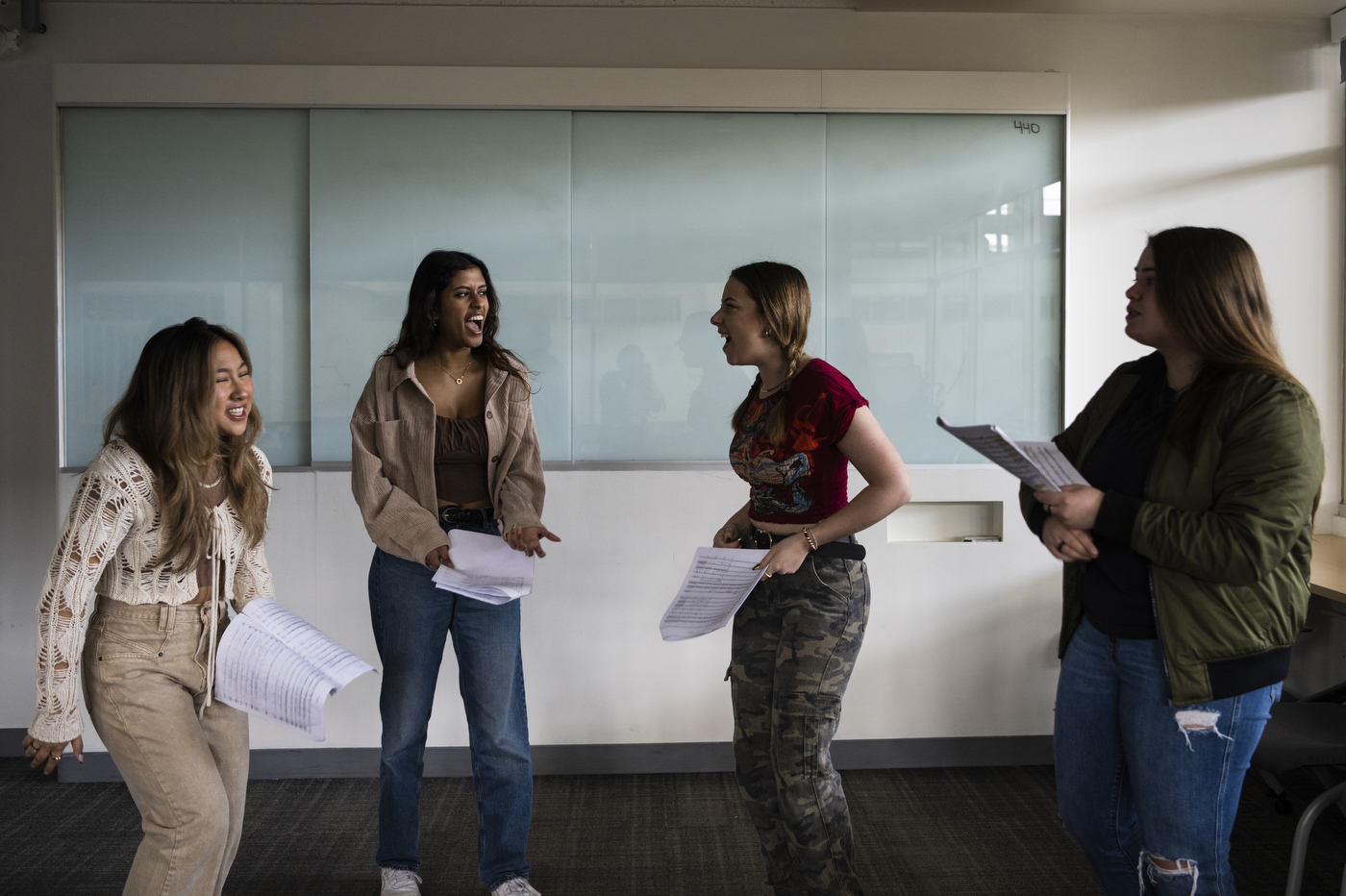 Jessica Garcia, Nealaksi Maniraja, Julia Chase, and Olivia Materesky singing