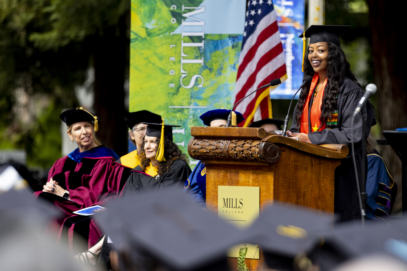 Edin Haddis speaking at Mills College at Northeastern