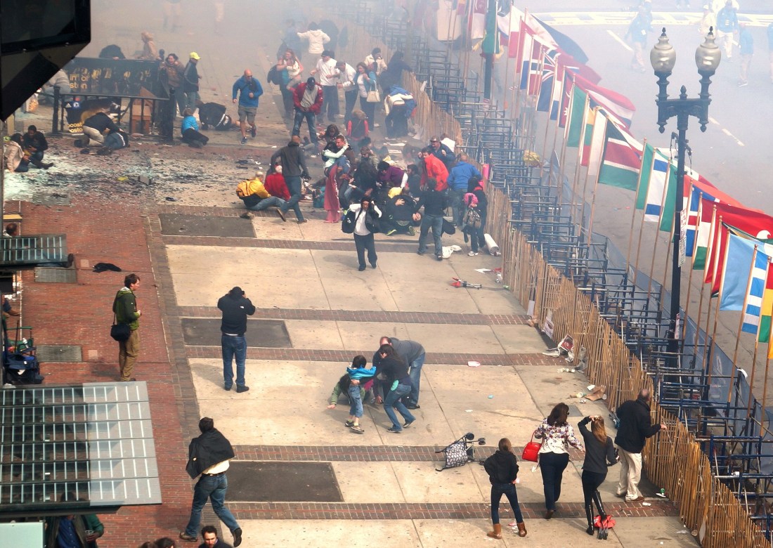 people running to escape the bombing