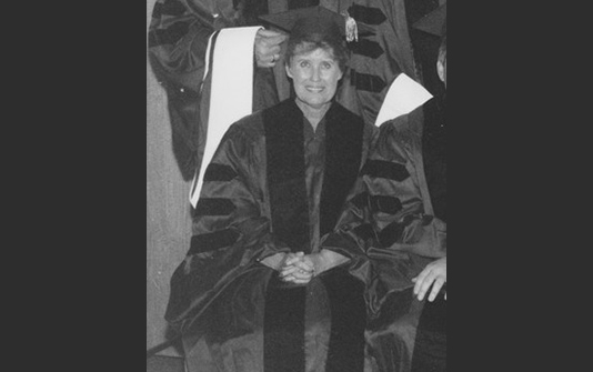 Erma Louise Bombeck in commencement regalia