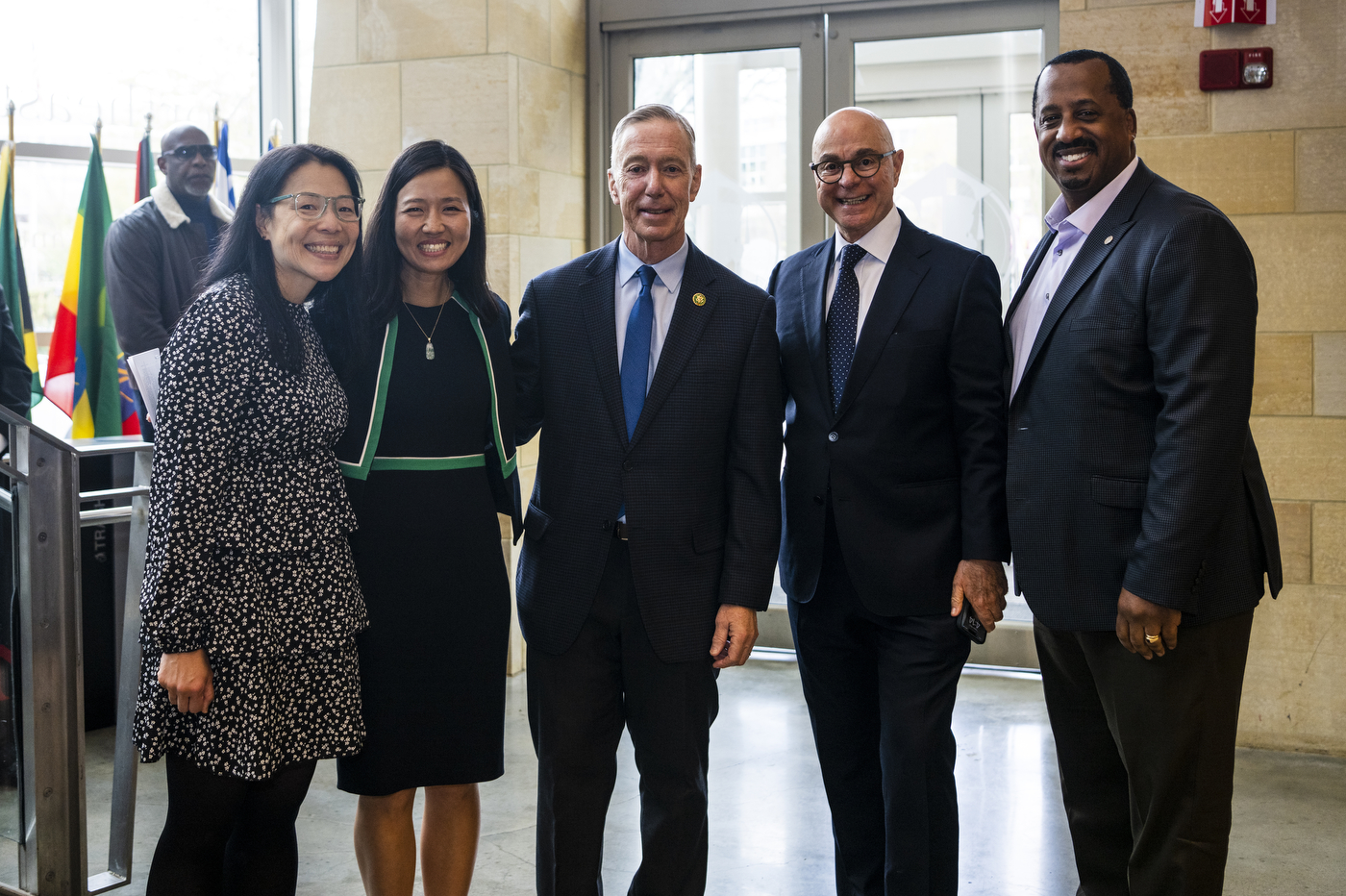 President Aoun, Mayor Wu, and Congressman Lynch posing with several city of Boston employees