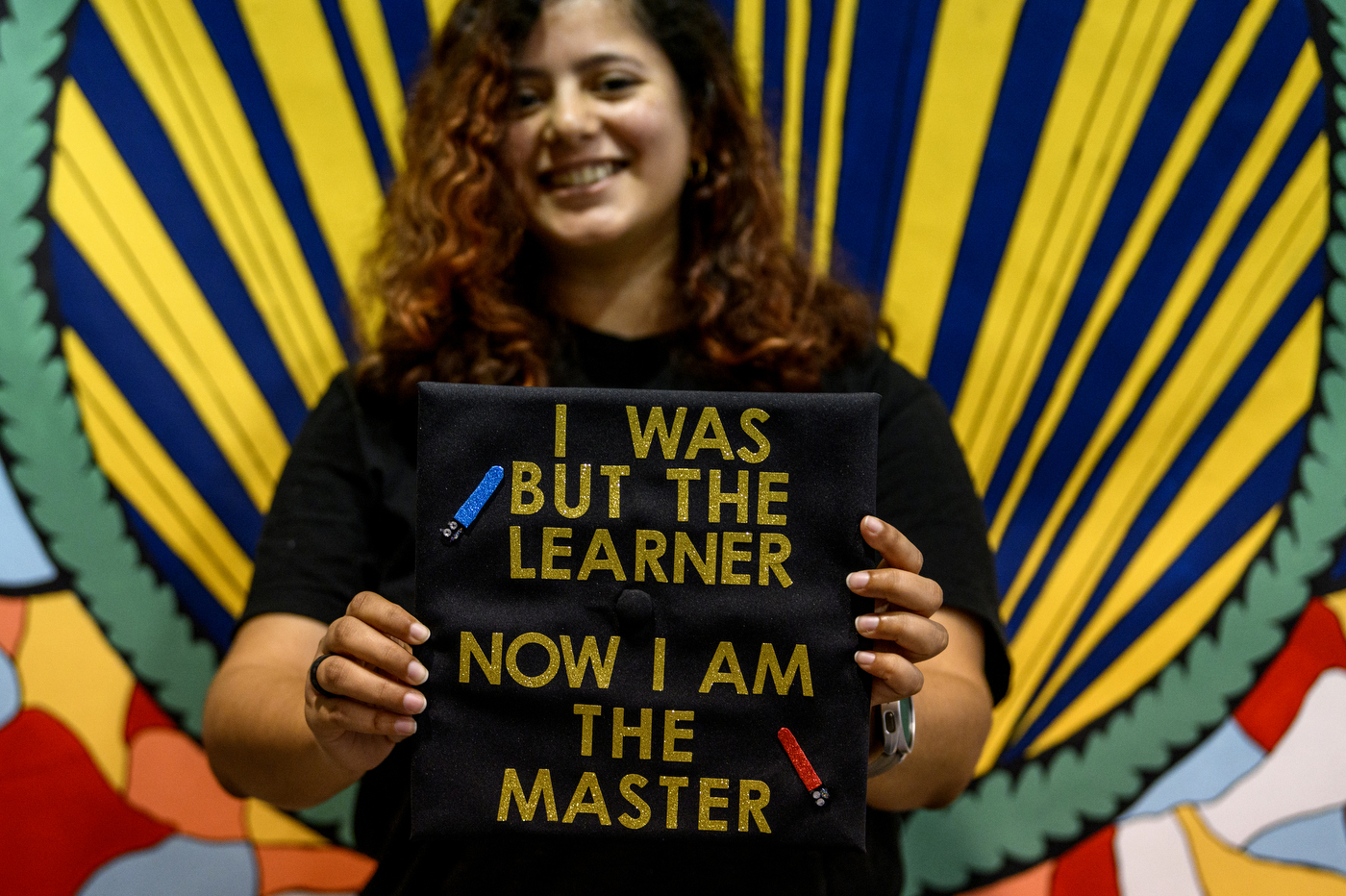 A graduate showing her mortarboard