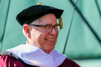 Alberto Ibargüen wearing commencement regalia