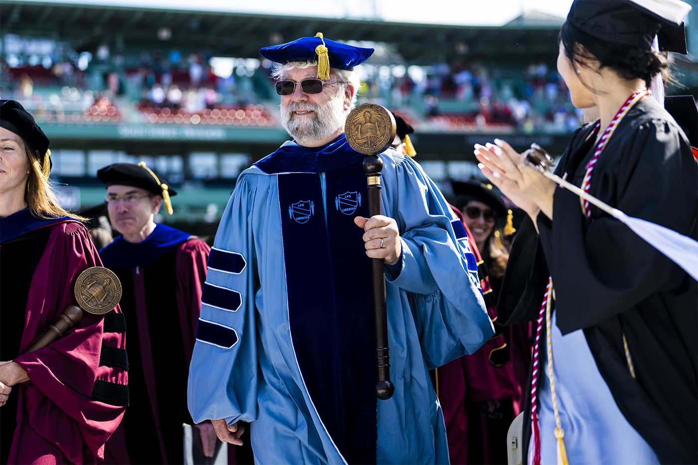 Chris Bosso holding ceremonial mace