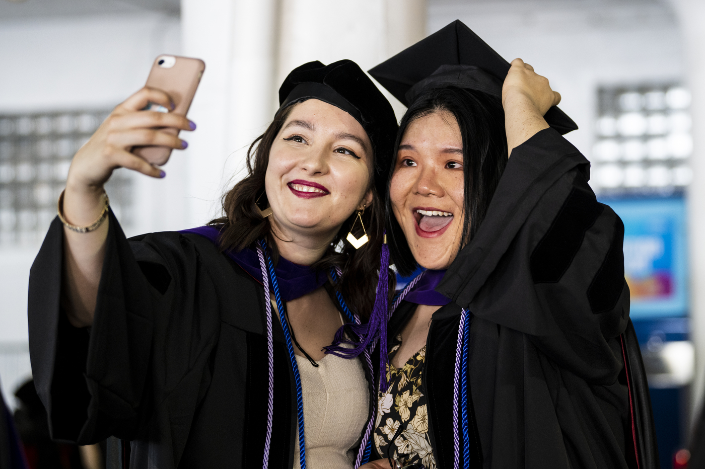 Northeastern graduates take a picture.