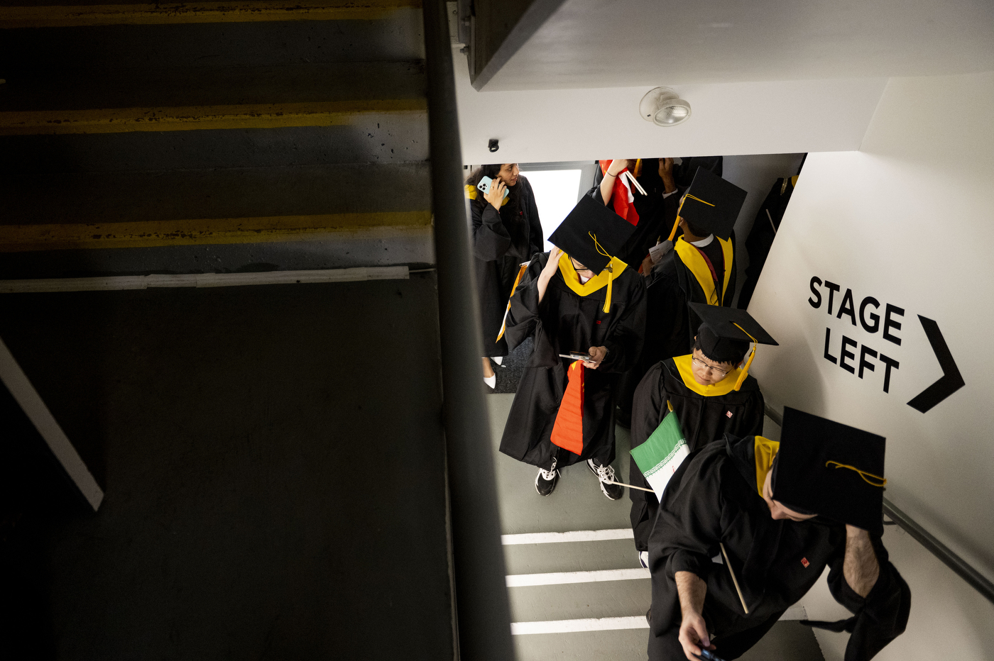 graduates lined up to walk on stage at Vancouver convocation