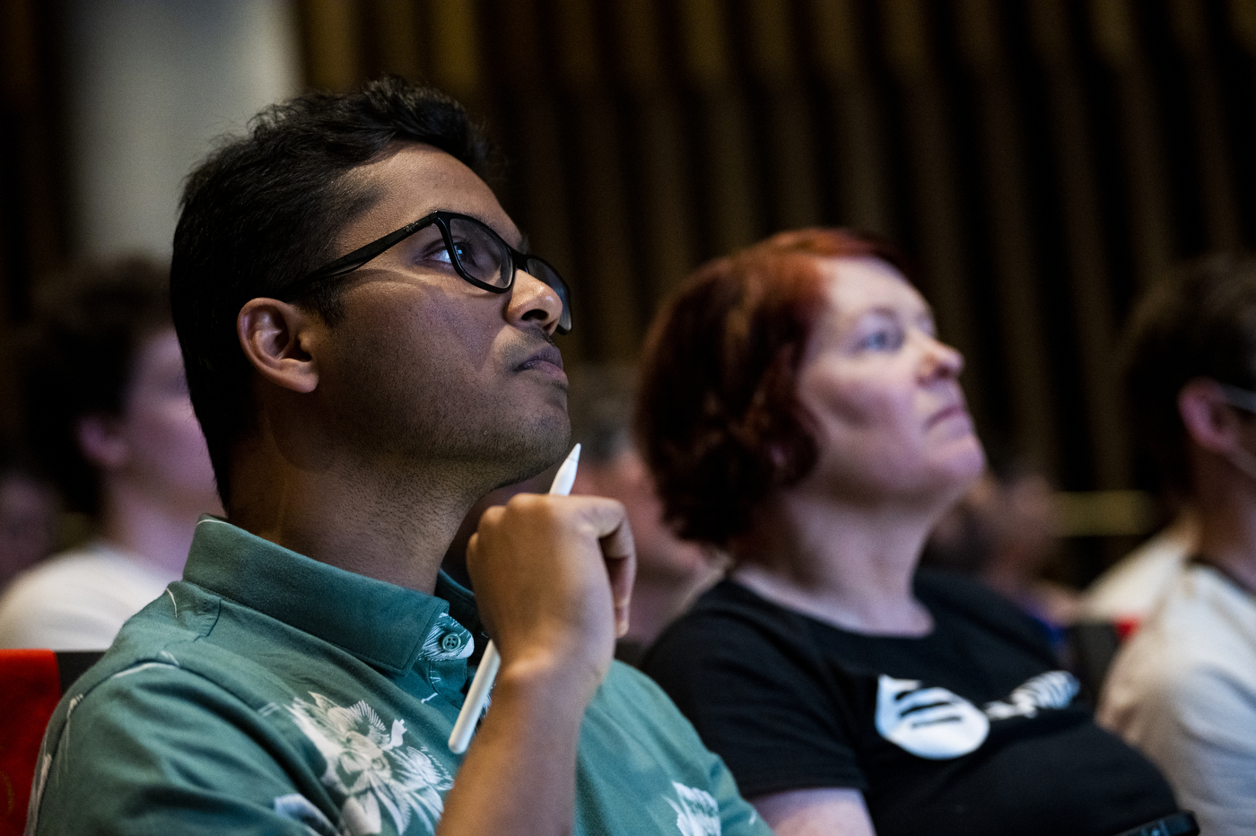 audience members at AI fireside chat at Northeastern University's ISEC building