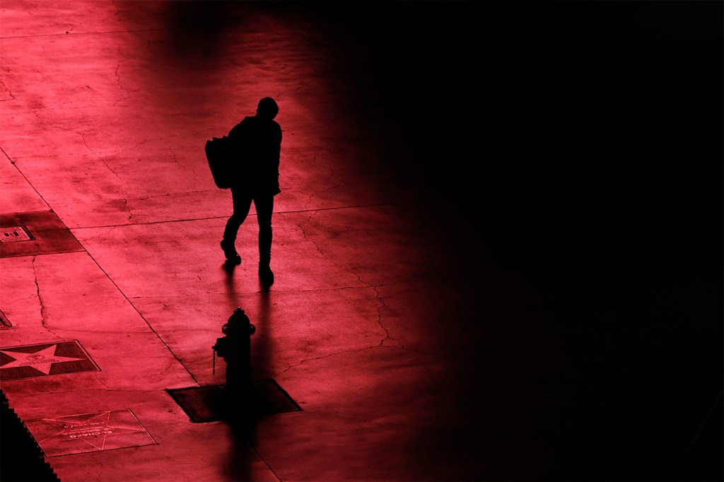 silhouette of a person walking