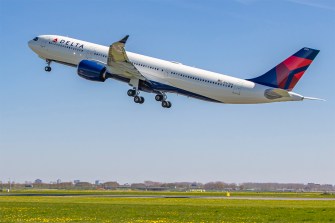 Delta Airlines airplane taking off from a runway