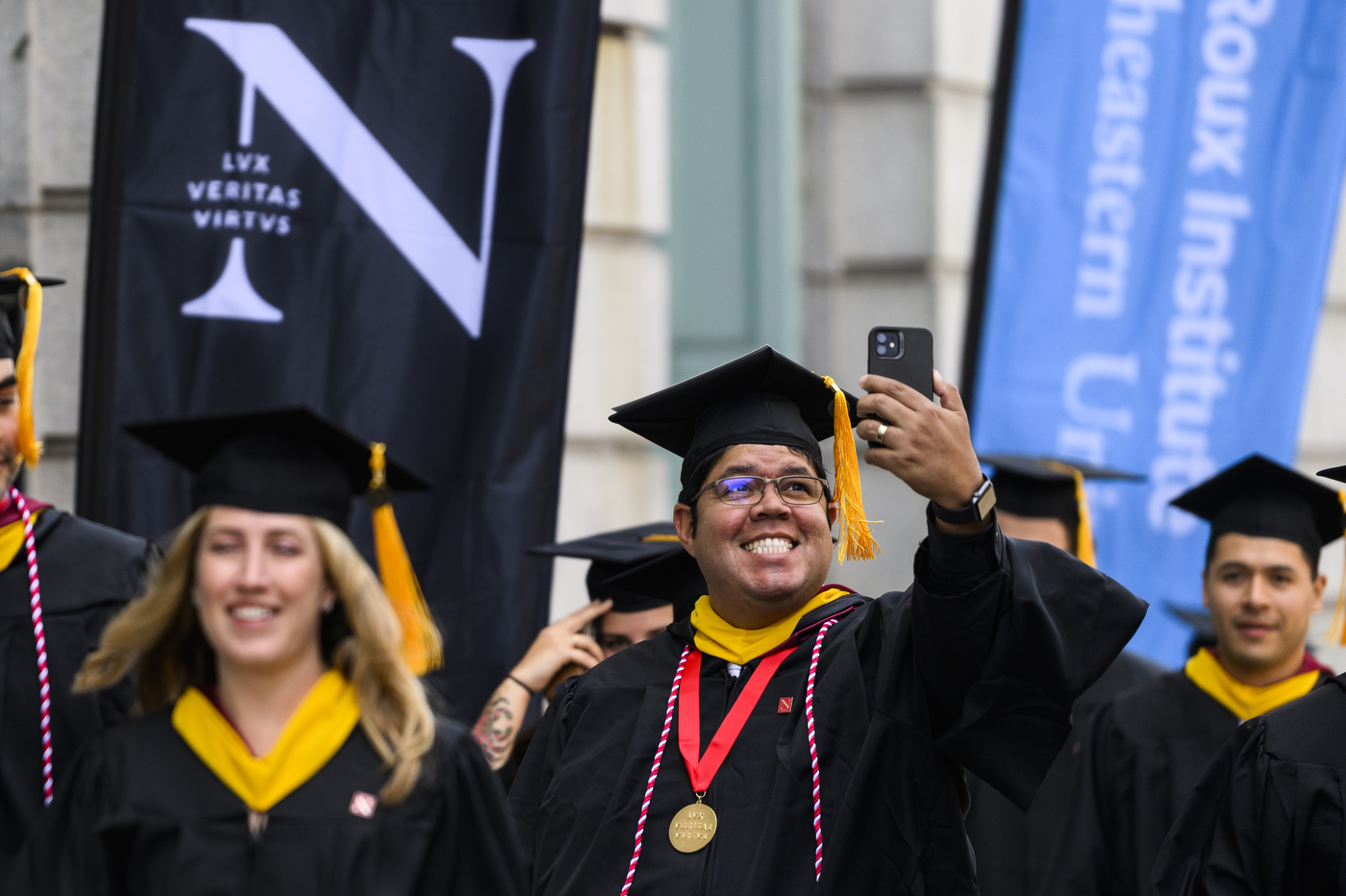 graduate taking selfie