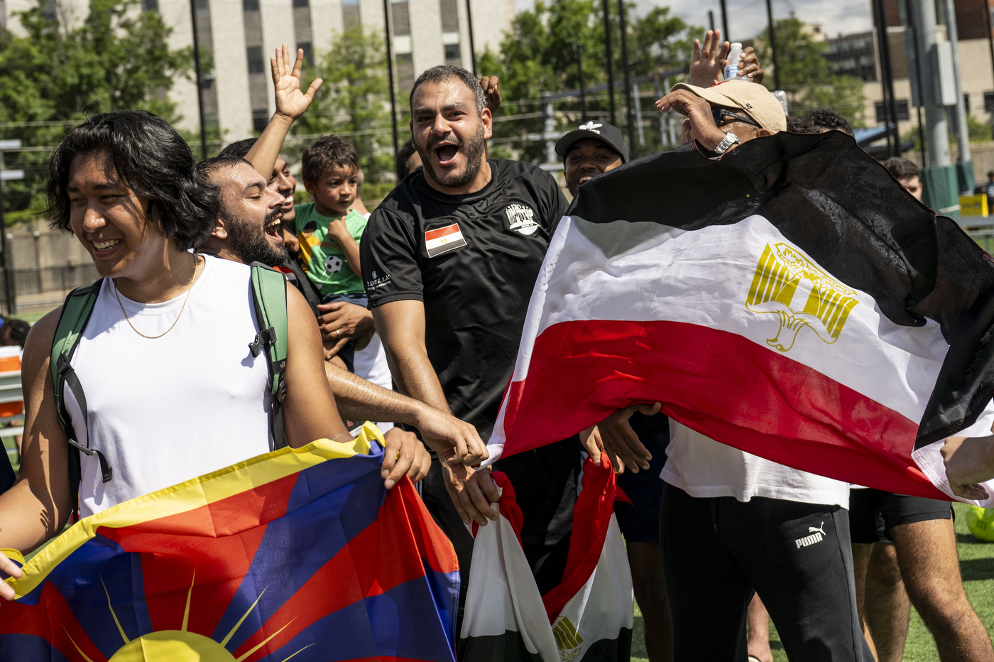 People cheer at the Boston Unity Cup soccer tournament.