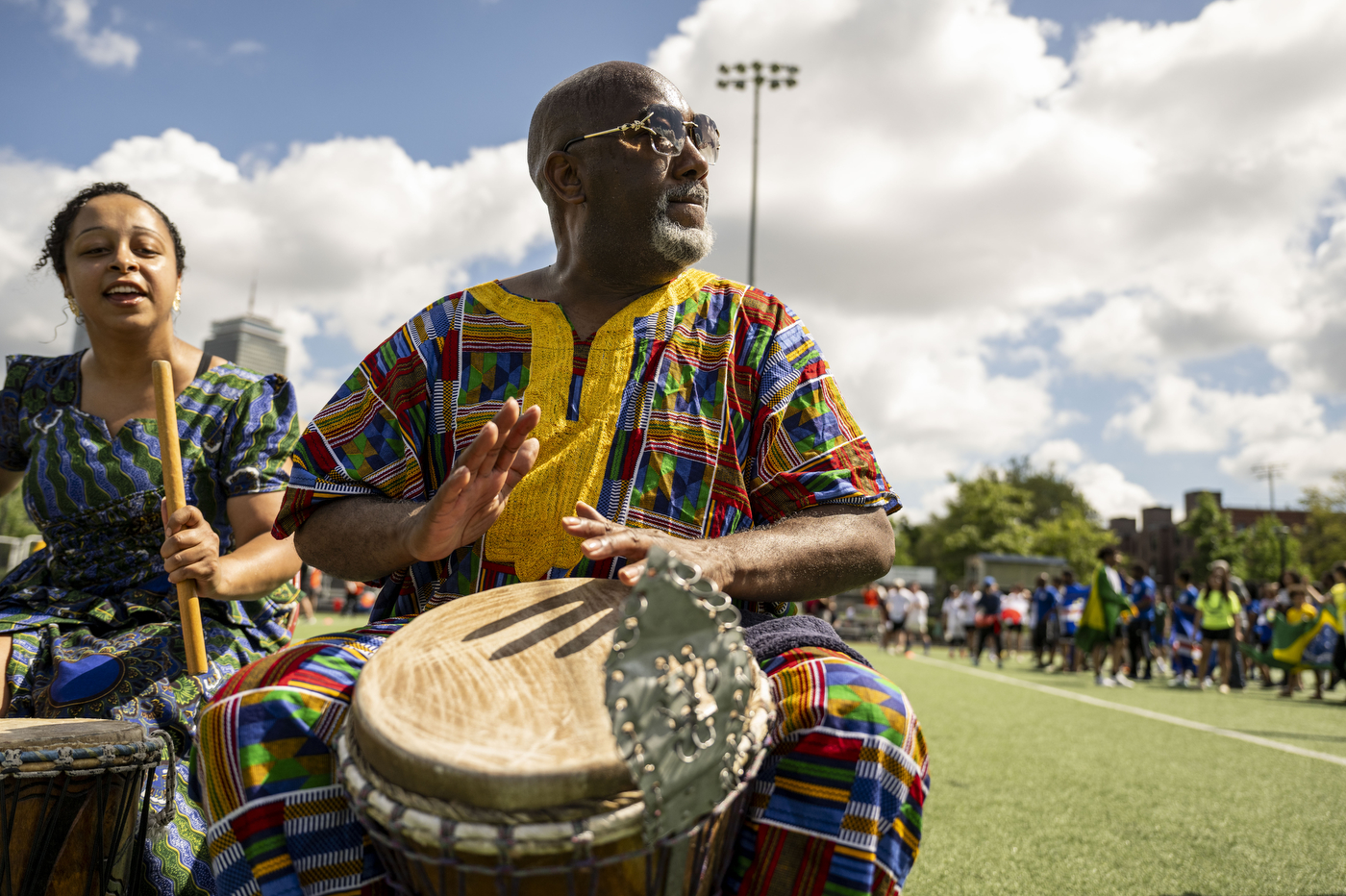 A person plays the drums.