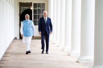 president Joe Biden walking with Prime Minister Narendra Modi