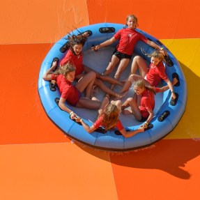 kids riding on a waterpark ride