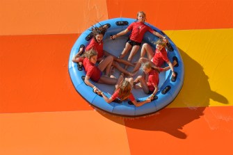 kids riding on a waterpark ride