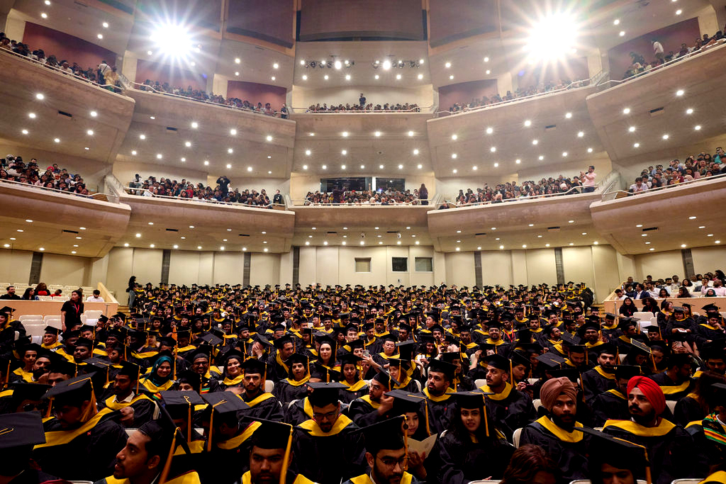 Graduates celebrate at Northeastern's Toronto convocation.