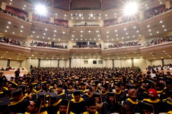 Graduates celebrate at Northeastern's Toronto convocation.