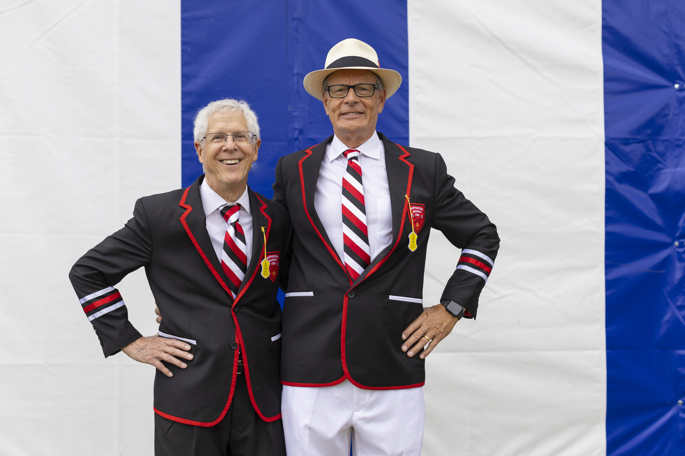 two members of the 1974 crew posing next to each other