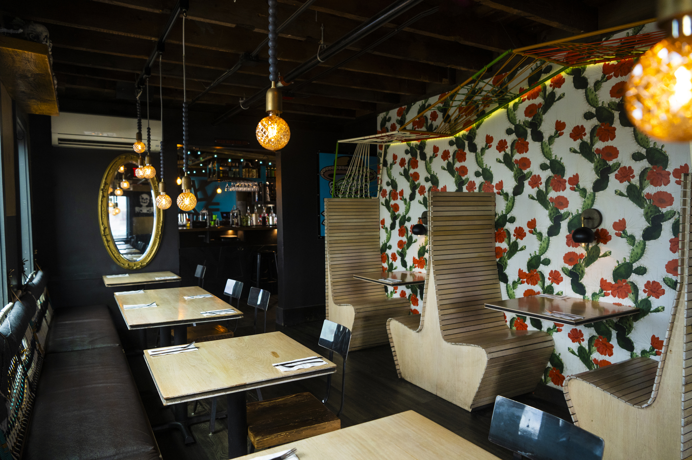 tables and booths inside Scott Kirmil's restaurant